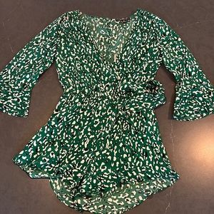 Cute patterned green romper